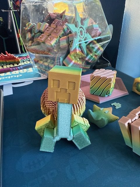 Minecraft style toy display on a table inside DubDub AI Arcade