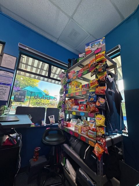 Snack rack and front area inside DubDub AI Arcade
