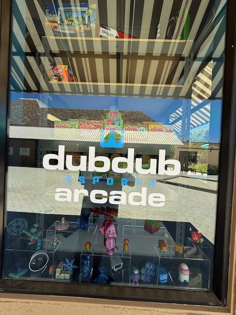 DubDub Arcade window display with colorful items and signage